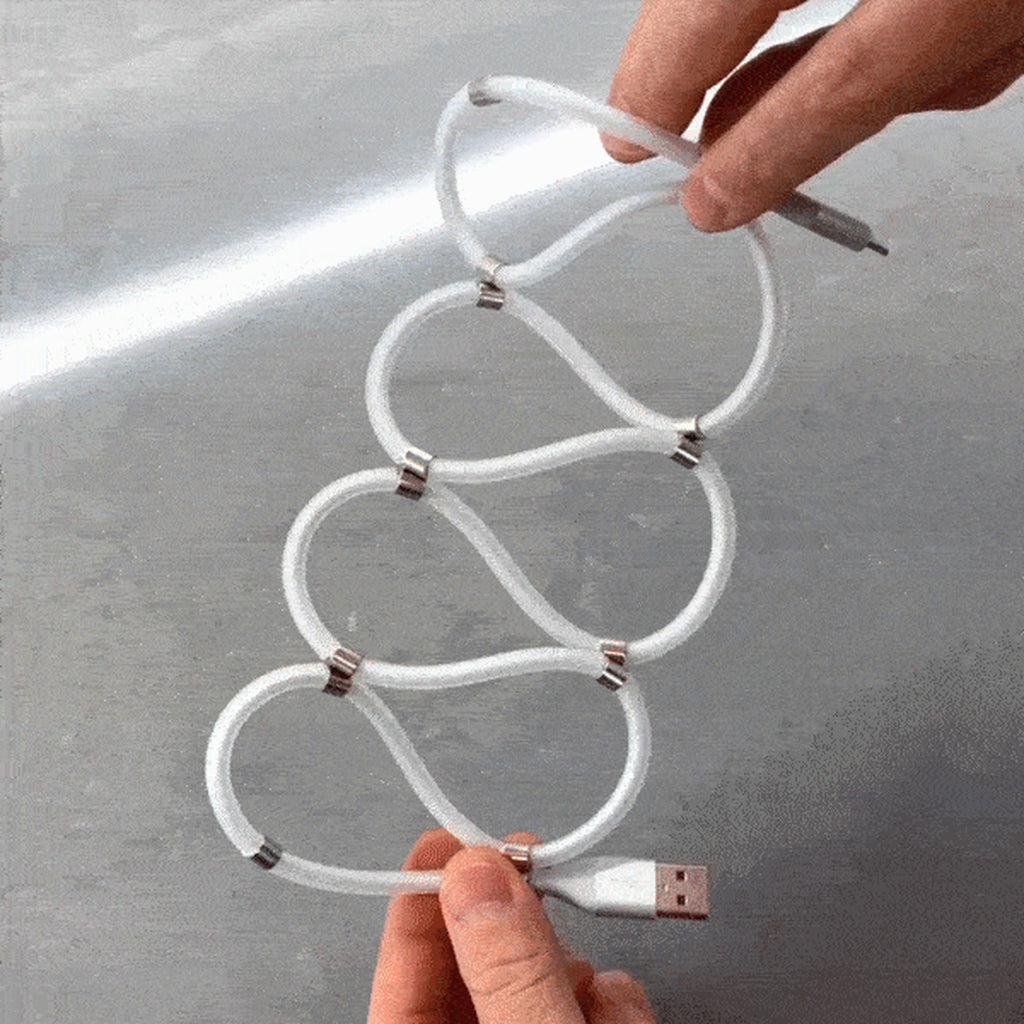 Magnetic self-winding charging cable coiled into a figure-eight